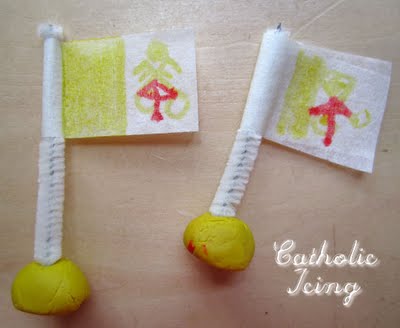 Papal Flag with pipe cleaner, making tape, and clay