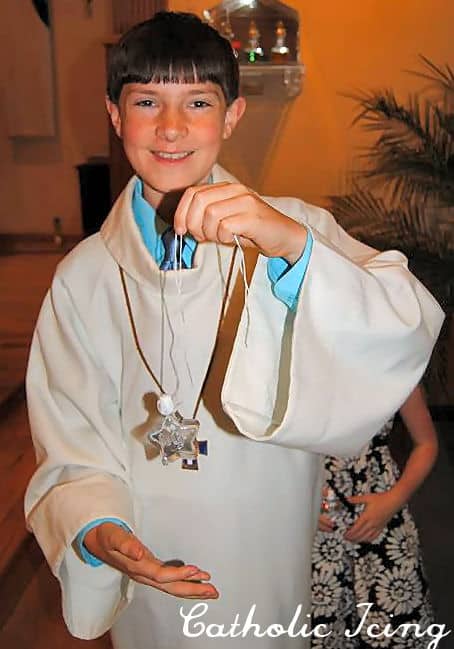 altar server with holy water bottle necklace
